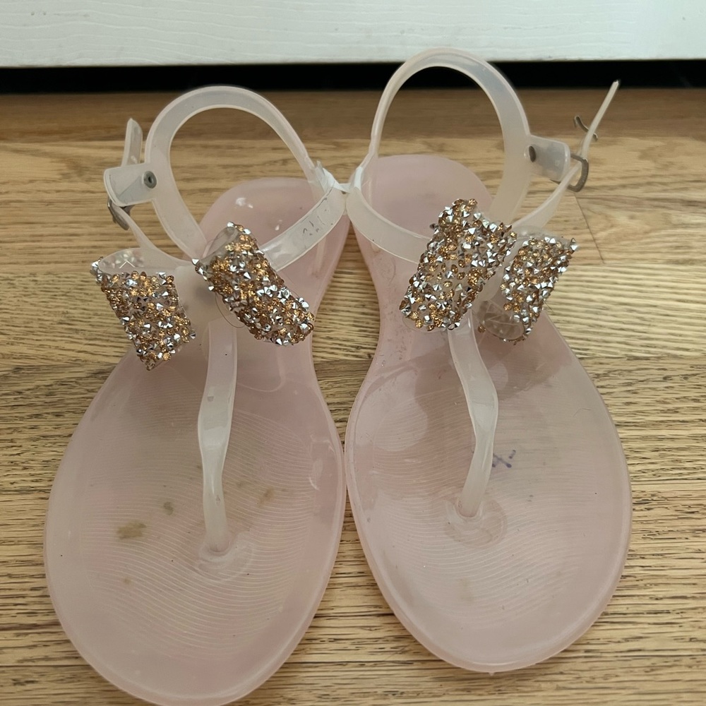 Jelly sandals with glitter bows